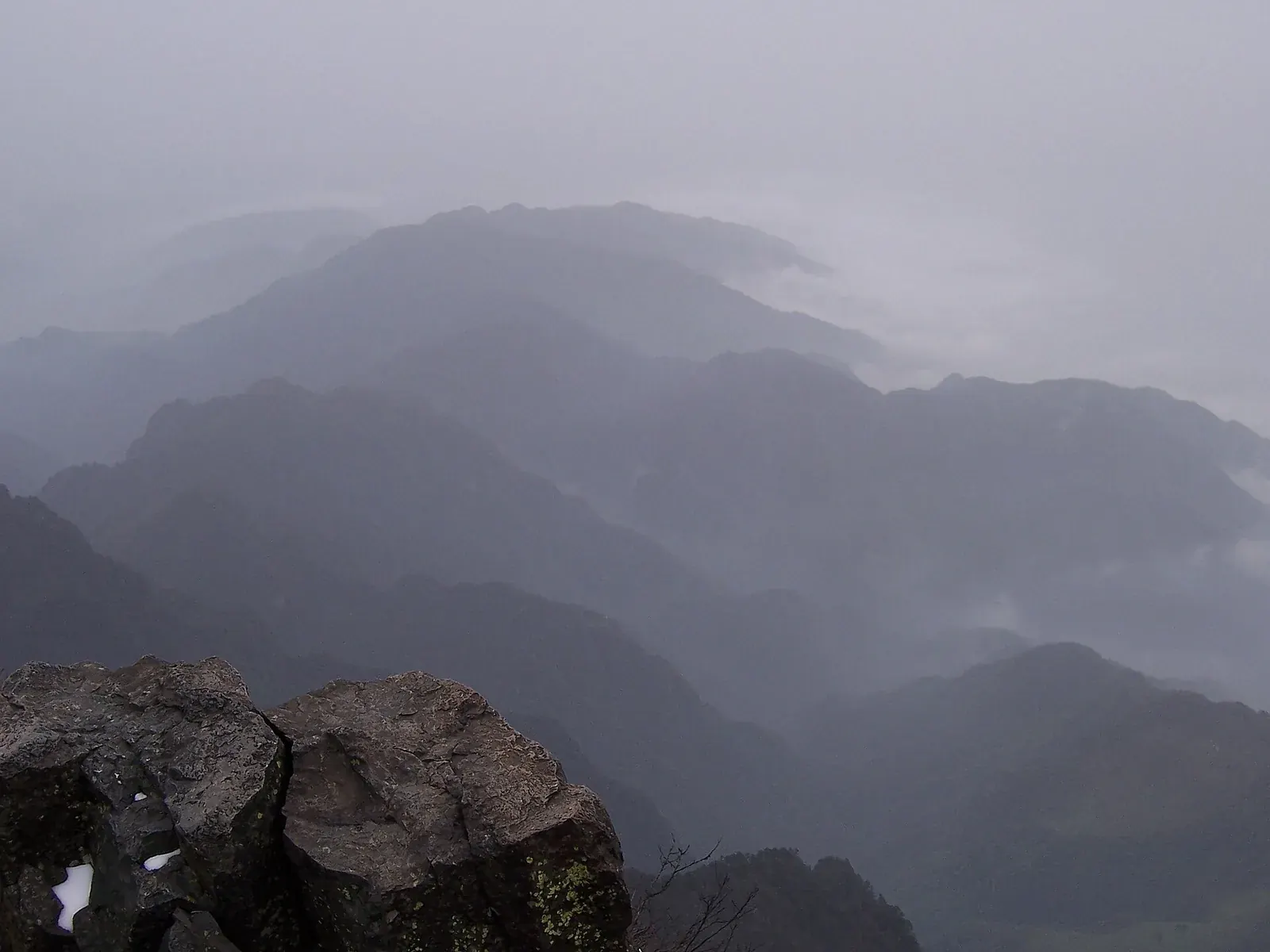 Cloud-wrapped ridges on Mount Emei